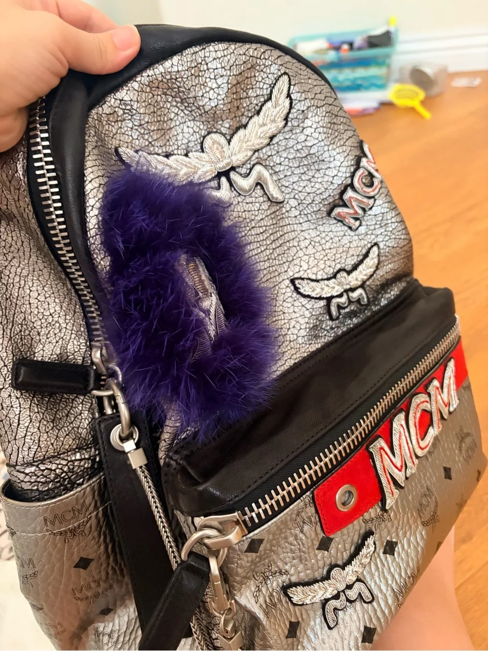 MCM Silver Leather Backpack with Purple Fur Pom